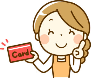 クレジットカードを持った主婦